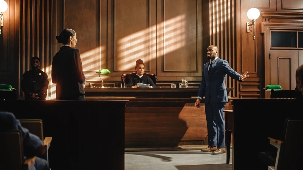 A criminal defense attorney defending a client in court