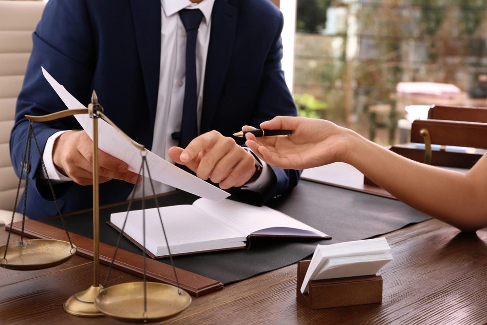 A domestic violence attorney providing legal advice to a client